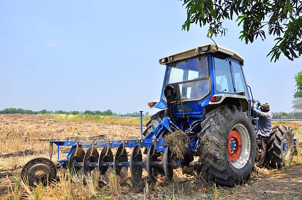 istock big tractor on the grass field,Thailand 174245700