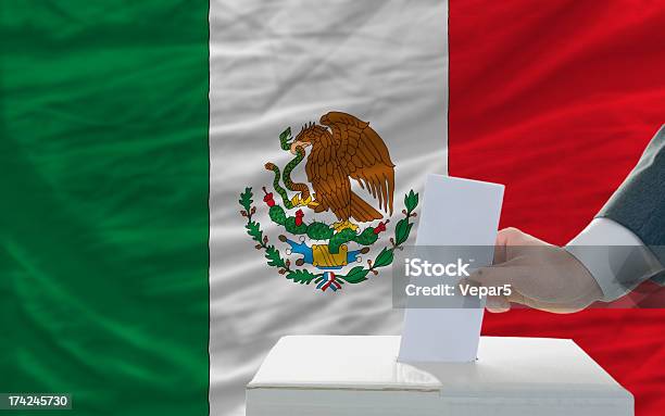 Man Voting On Elections In Mexico Front Of Flag Stock Photo - Download Image Now - Election, Mexico, Choice