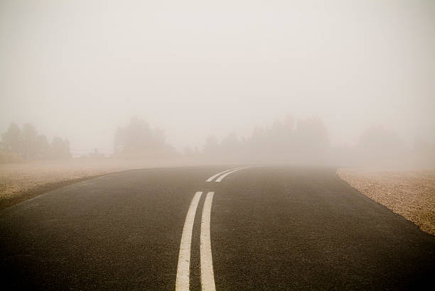 istock A foggy road with no passing lines 174245784