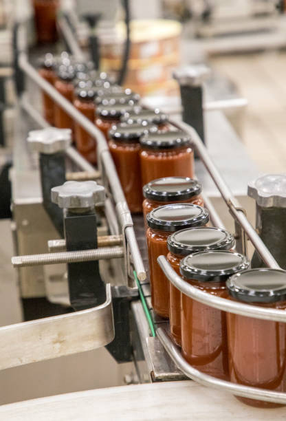 Glass jars with different kinds of jam