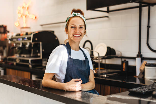 istock Successful small business owner working in her coffee bar 1742461596