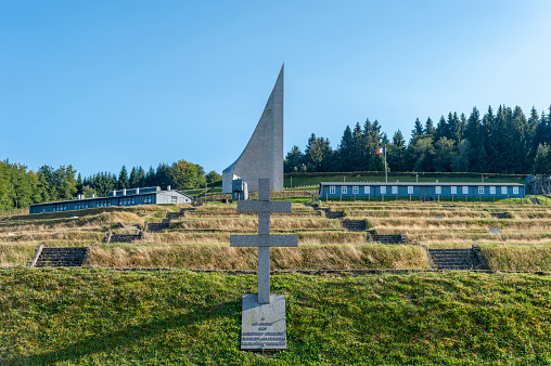 Natzwiller, France - September 14, 2021: Natzweiler-Struthof concentration camp and view to Lighthouse of Remembrance memorial. Bas-Rhin department in Alsace region of France
