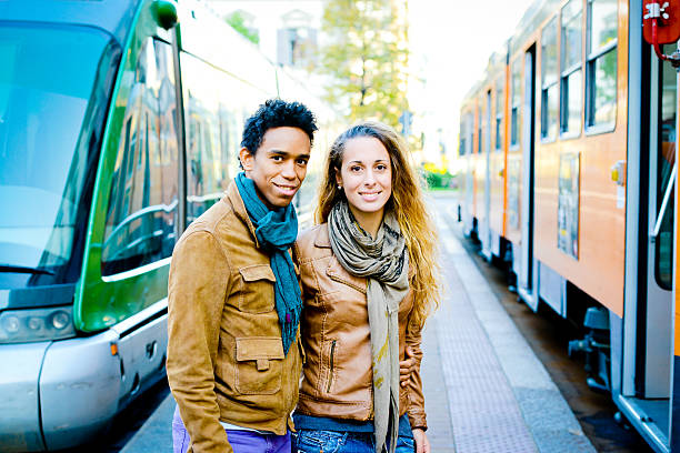 istock Lovely interracial couple on tramway station, Milan 174247572