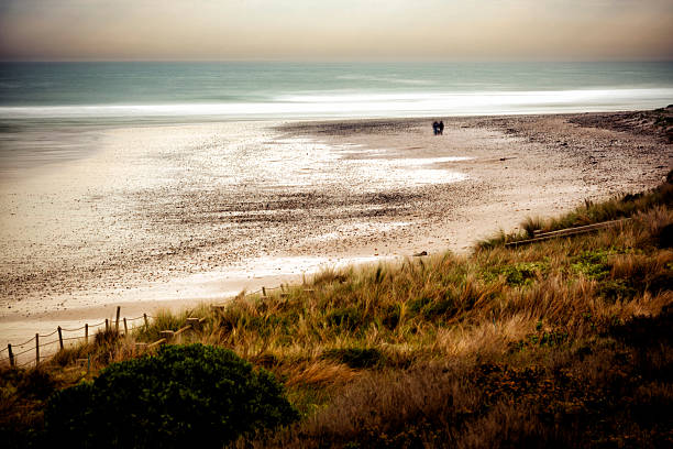 istock Lonely beach with two people 174248700