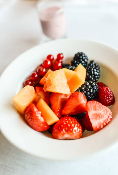 istock Healthy Fruit Salad and Smoothie on a table 174248987