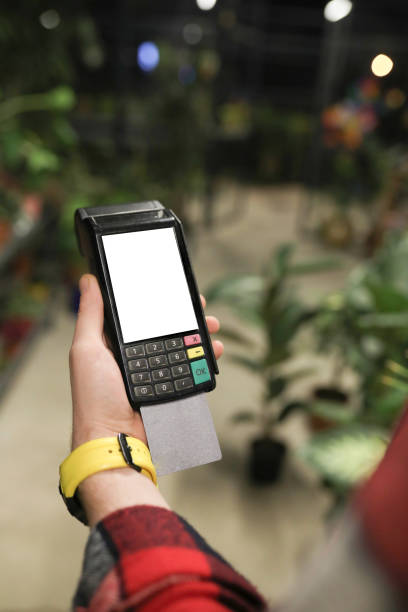 istock Paying Via Credit Card Via Pos Device 1742505568