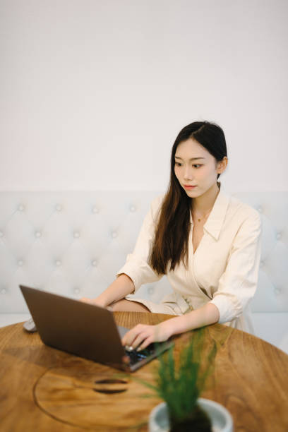 istock Beautiful Asian women use laptops at home 1742507786