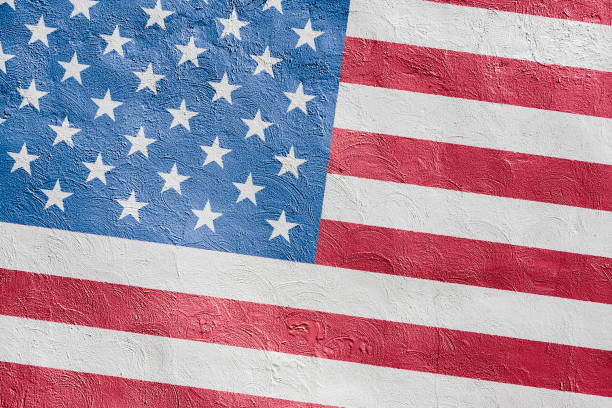 istock American Flag on Stone Wall 1742519513