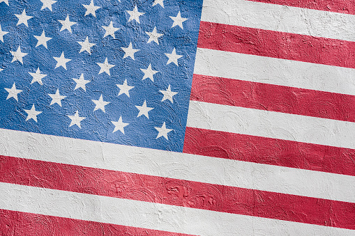 Full frame photo of a weathered flag of United States