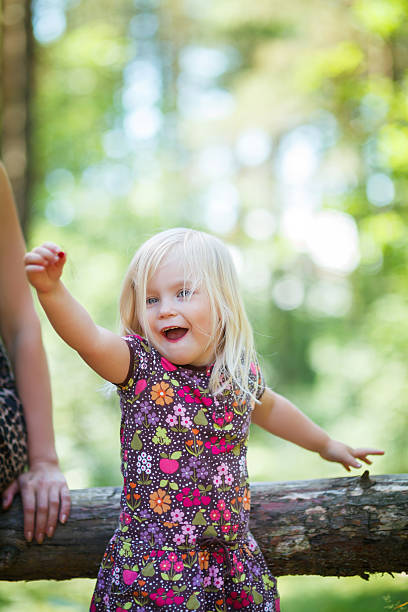 istock Little happy girl in the forest 174252434