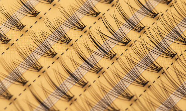 Modern set of false eyelashes for gluing. Women's cosmetics, close-up Modern set of false eyelashes for gluing. Women's cosmetics. clump eyelashes stock pictures, royalty-free photos & images