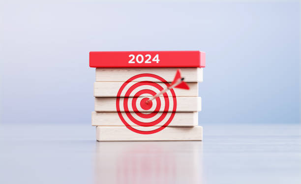 2024 Written Wood Blocks Sitting on Wood Surface in Front a Defocused Background