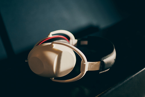 White headphones in recording studio