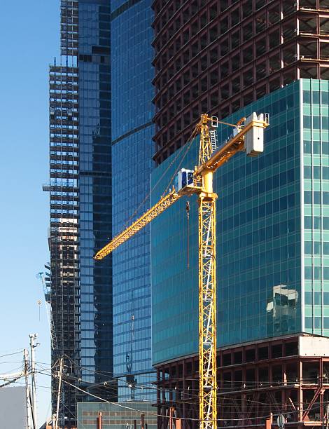 istock Lifting crane and buildings 174254894