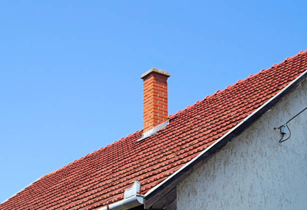 roof of a house with smoke stack