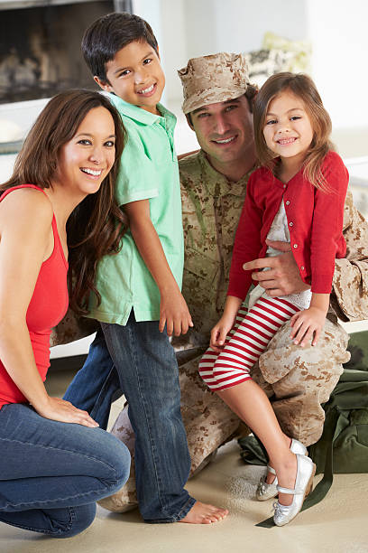istock Family Greeting Military Father Home On Leave 174255681