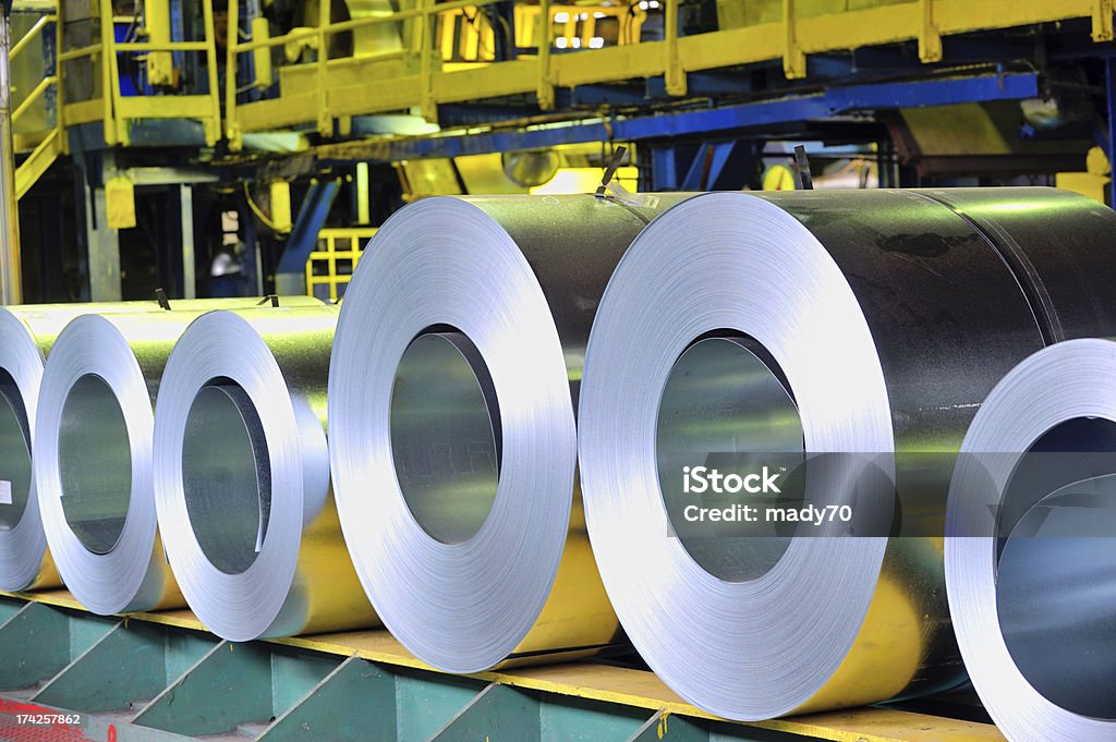 rolls of steel sheet rolls of steel sheet in a plant Rolled Up Stock Photo