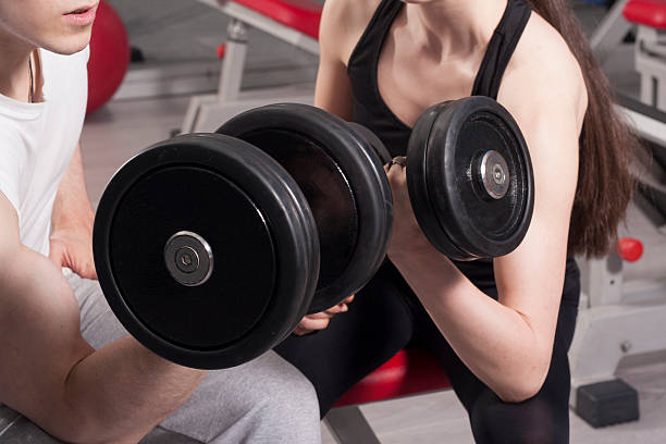 istock couple in the gym 174257939