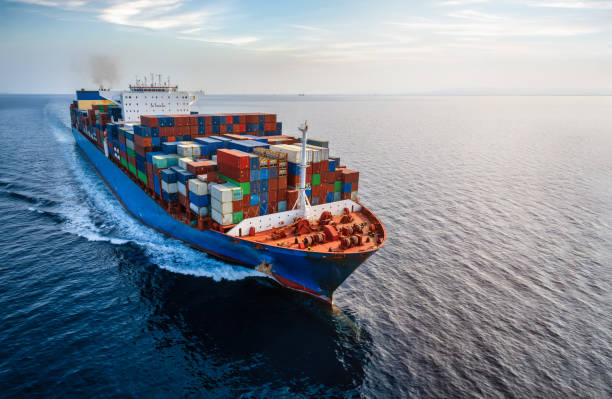 istock Aerial front view of a large container cargo ship over sea 1742579850