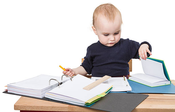 istock young child at writing desk 174259622