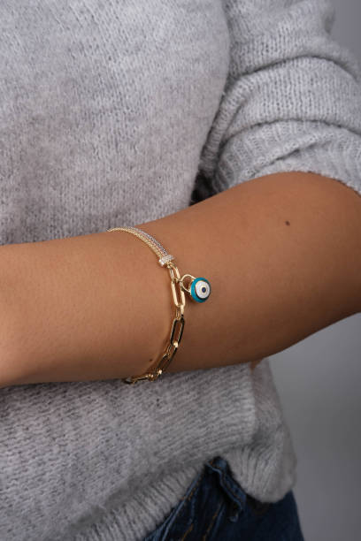 istock Gold bracelet in the woman's hand, 1742599396