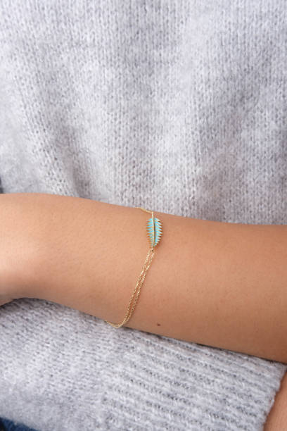 istock Gold bracelet in the woman's hand, 1742599422