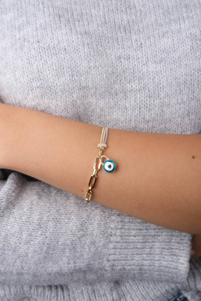 istock Gold bracelet in the woman's hand, 1742599432