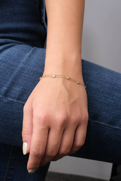 istock Gold bracelet in the woman's hand, 1742599468