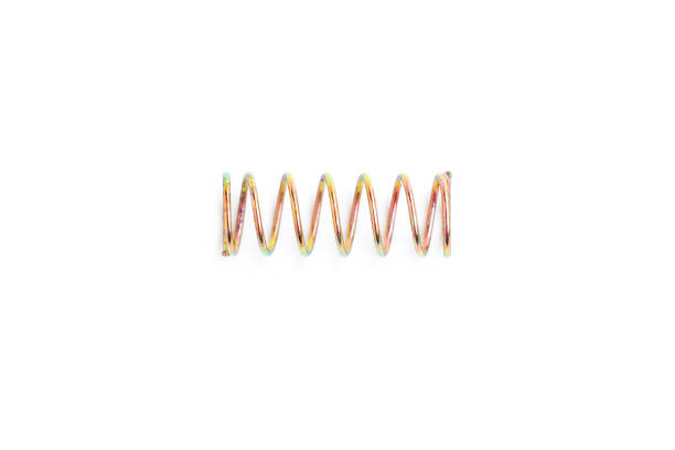 istock Golden helical coil spring isolated on white background, Old coil spring 1742613135