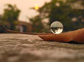 small crystal ball with twilight reflection