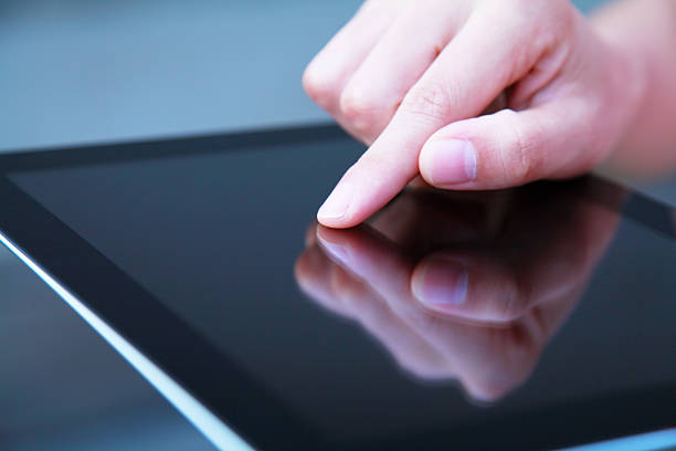 istock Business people hand holding digital tablet on light blue background 174261760
