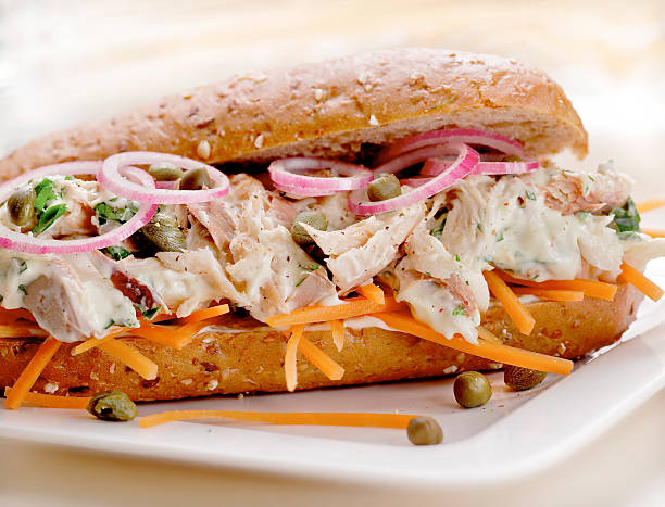 sandwich with salad of mackerel served on a plate