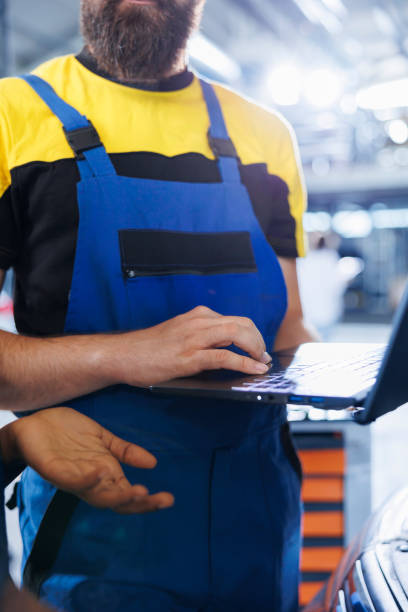 istock Employee calculates car repairs costs 1742681879