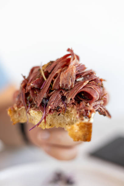 istock Large pastrami sandwich piled high with meat. Excessive Pastrami Sandwich 1742682907