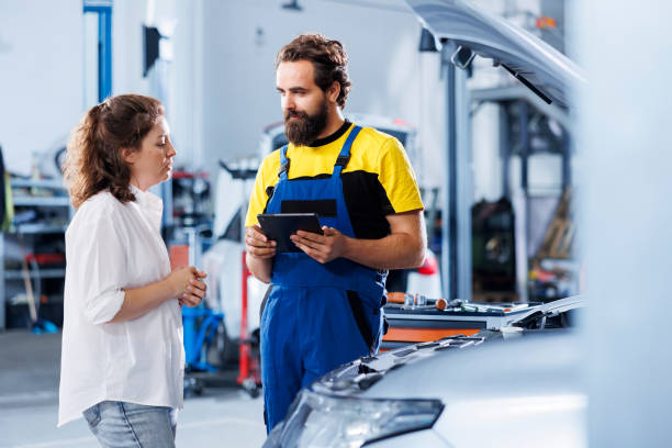 istock Employee conducts vehicle checkup 1742684054