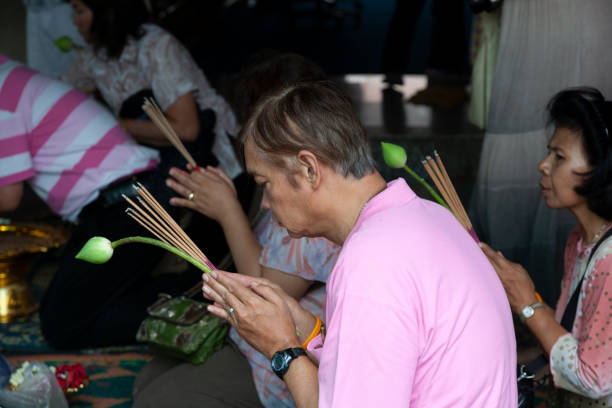 Bangkok, Thailand - April 5, 2011: People at worship at the Grand Palace