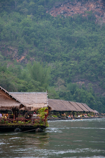 Baan Tahsao, Amphur Saiyok, Kanchanaburi 70150, Thailand - April 5, 2011: Floating raft houses on the River Kwai Noi, a holiday resort of river houses