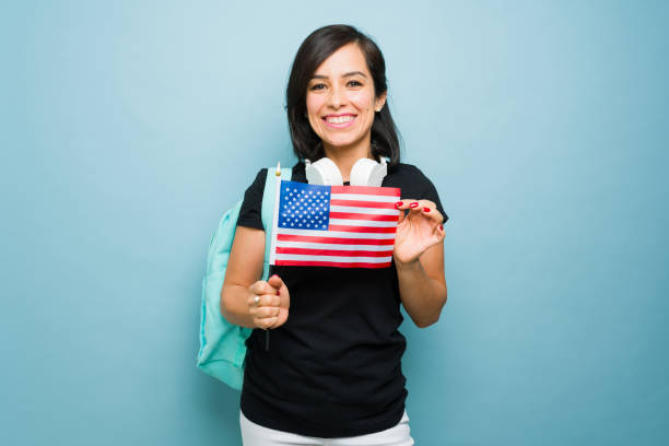 istock Smart young woman learning English and smiling 1742692306
