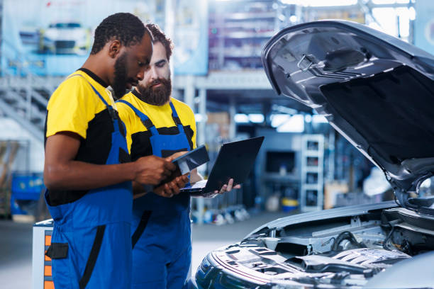 istock Coworkers calculate car fix costs 1742696572