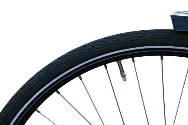 передние колеса на велосипеде, осколки на белом - bicycle bicycle pump inflating tire стоковые фото и изображения