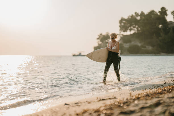 istock Woman surfer 1742705710