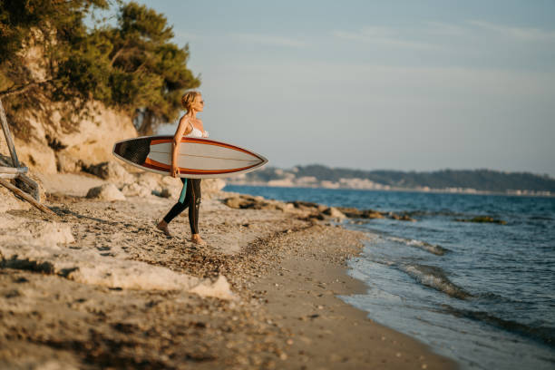 istock Mature female going surfing 1742710102