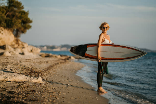 Mature female surfer