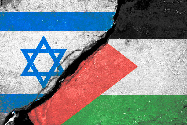 istock Wall crack separate between Israel flag and Palestine flag 1742712668