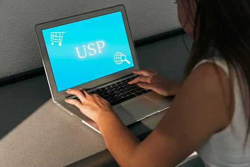 woman on the internet searching the web and shopping ,concept of usp or unique selling point .