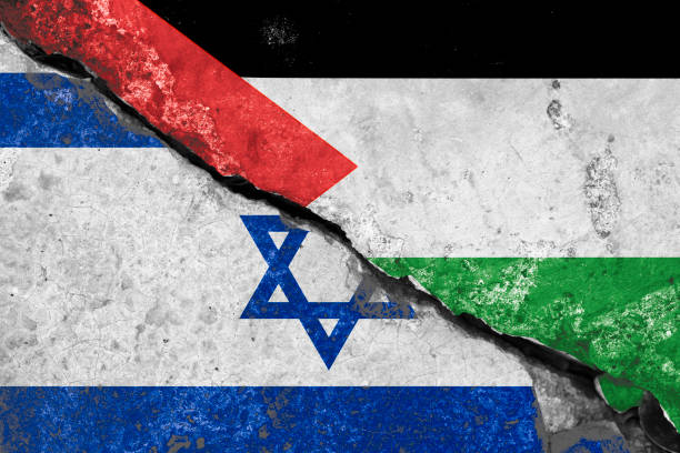 istock Wall crack separate between Israel flag and Palestine flag 1742713849