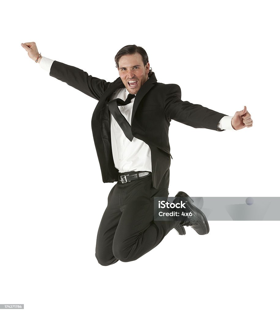 Excited молодой �бизнесмен прыжки - Стоковые фото 20-29 лет роялти-фри