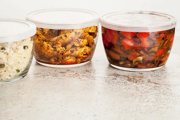 Photo of dinner meal in glass containers