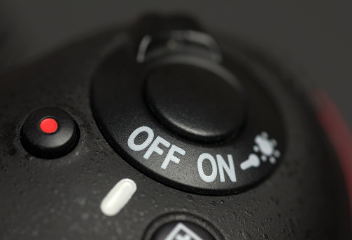 On Off Button turned Off and Shutter button on DSRL Camera