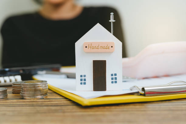 istock Wooden house model with copy space, new house concept. 1742773569